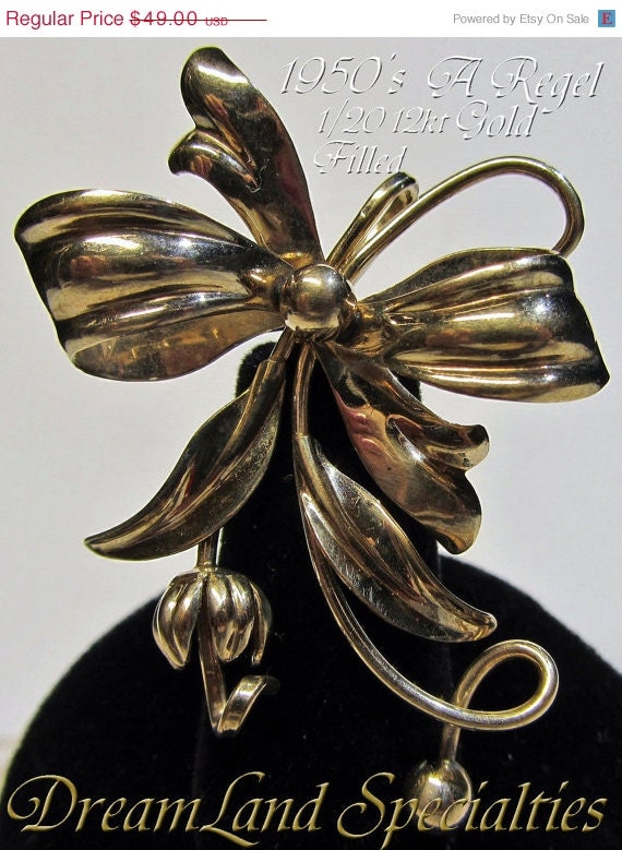 A Regel Vintage Jewelry 1/20 12kt Gold Filled Bow and Flower Brooch