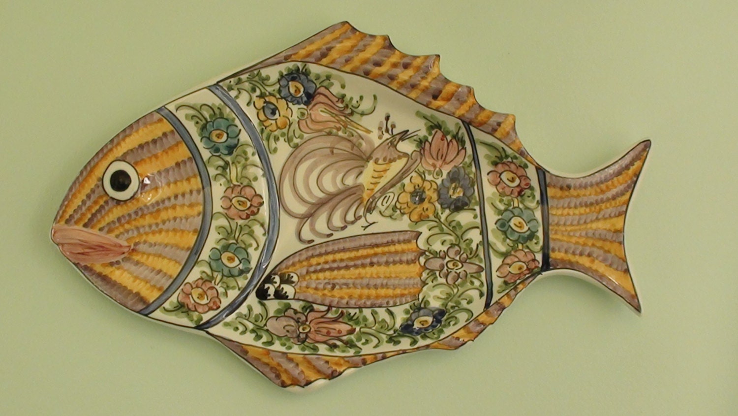 Handmade and hand painted ceramic fish plate.