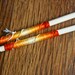 Hand decorated pair of long cooking bamboo chopsticks by Flower Power Nation