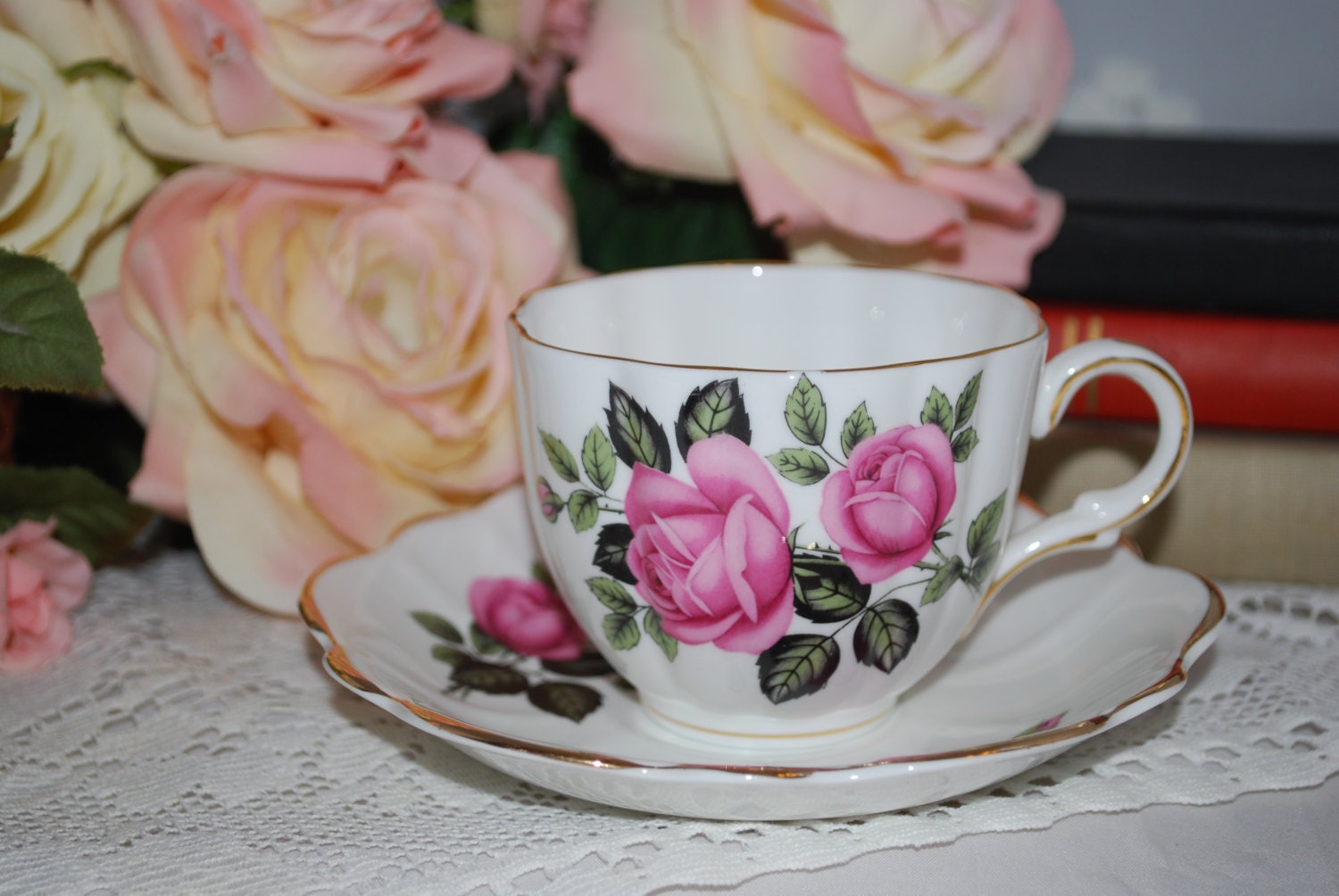 Vintage Tea cup and saucer. Bone China from England with beautiful rose pattern