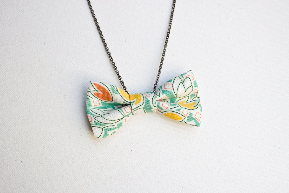 Green and White Bow Tie Necklace with Yellow and Red Tulip Pattern