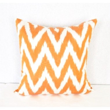 Yellow white ikat pillow cover.