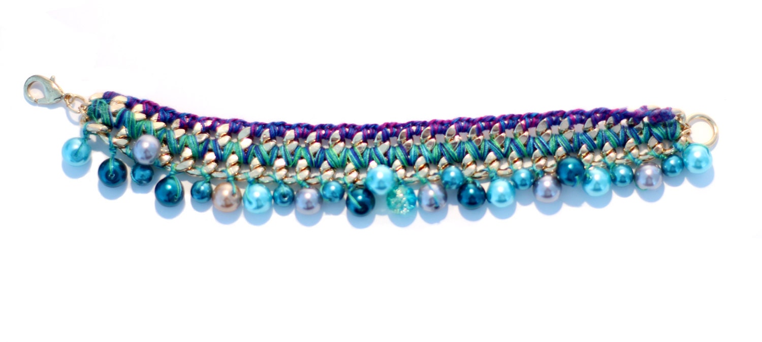 Gold Plated Charm Bracelet "Purple Rain", double woven with green-blue and lila cotton thread, and pearls