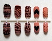 Nude Mixed Prints False Nail Set featuring Polka Dots, Aztec Print, Cheetah Print, Stripes and Heart