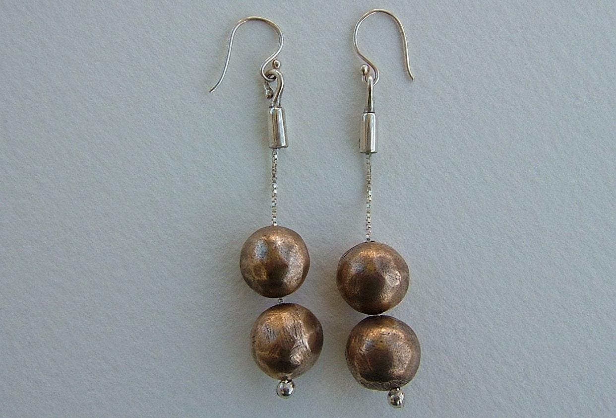 Twin Orbs Suspended on a Sterling Silver Chain