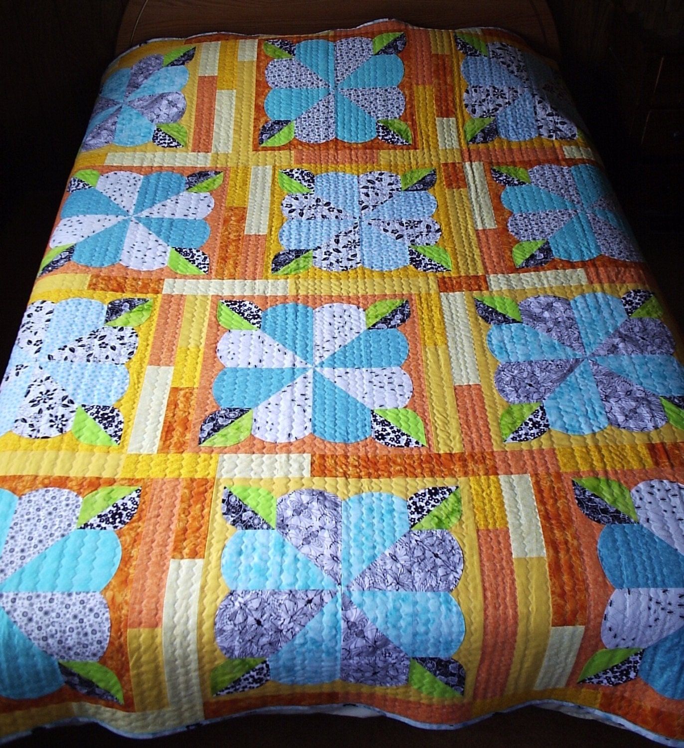 Queen size, queen sized, handmade quilt, turquoise, blue, Flowers, Sun, bed, turquoise, black and white, yellow, orange, green, batik.