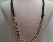 Nautical rope knot necklace with gold colored aluminium chain