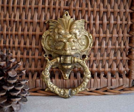 vintage English brass devil or mythical door knocker