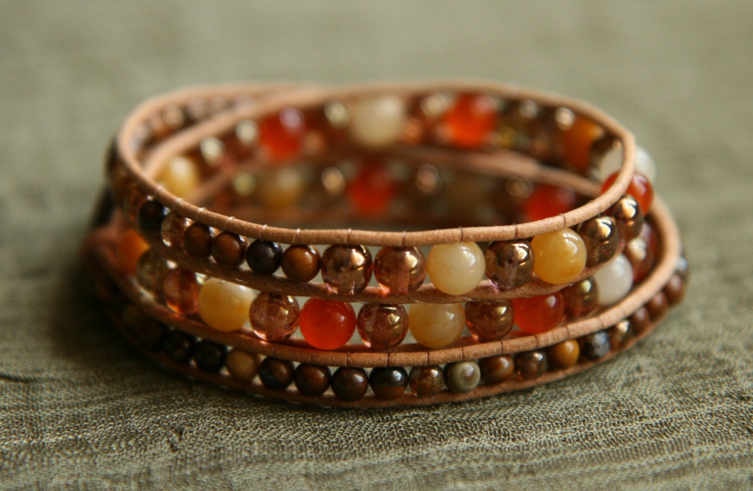 Orange Jade, Quartzite Triple Wrap Leather Beaded Bracelet.  Semiprecious stones, Czech glass and Zebra Jasper beads, Copper Artisan Button