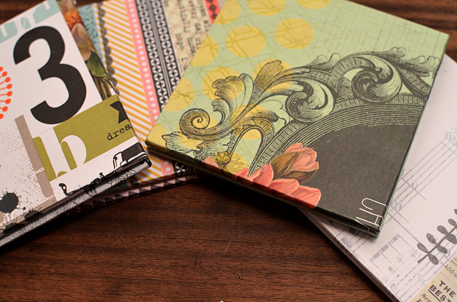Set of four (4) handmade, accordion-style books. 3x3, custom orders available.