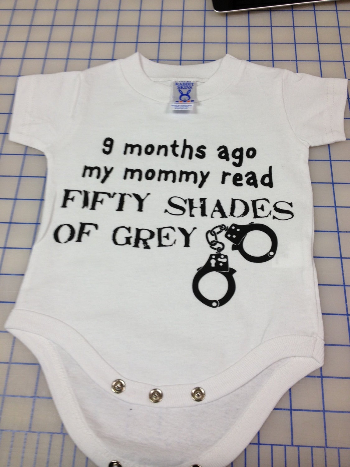 Cute. Funny. Custom Baby onesie " 9 months ago my mommy read fifty shades of grey"