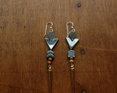 Hemitite and gold spear earrings