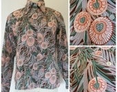 70s blouse does retro 20s foiliage style print, textile is sort of art deco and 50s tropical bark poly crepe fabric, beautiful.