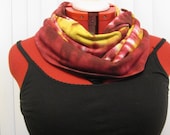 Reversible Tie Dye Infinity Scarf in Reds, Yellows and Black.
