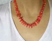 Button necklace, hand dyed coral buttons and coral pearl beads.