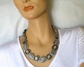 Silver gray vintage button necklace.