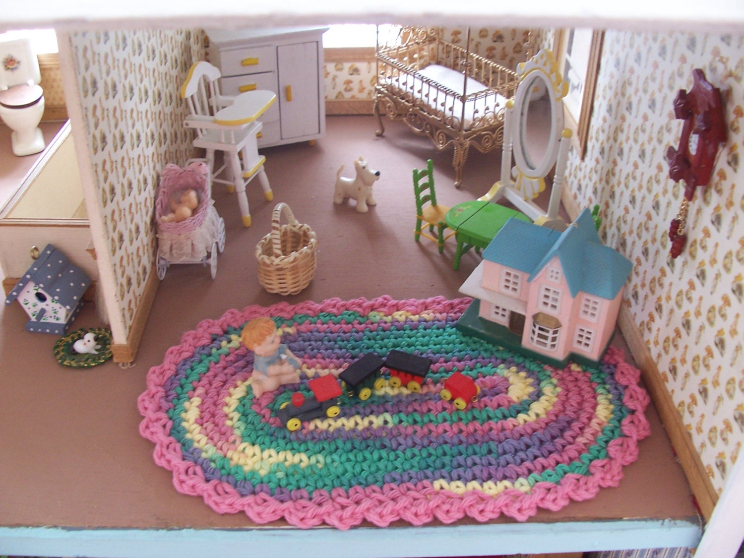 Miniature  crochet oval rug in pastels for the dollhouse