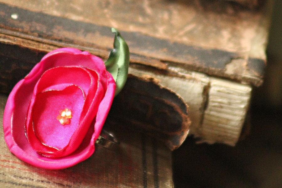 magenta and green blossom cocktail ring with sparkling golden beaded accent