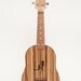 Zebra wood Ukulele (customizable sound hole of choice) Example: Cat