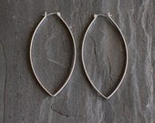 Sturdy sterling silver hoops with a twist designed to stand out with its modern leaf like shape and larger size - "Porter Hoop Earrings"