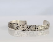 Sterling bracelet cuff with sea urchin texture, organic shape.