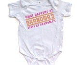 What Happens at Grandma's Stays at Grandma's - Pink & Yellow Design on White Short Sleeve Baby Bodysuit - 0375-4400-WHI