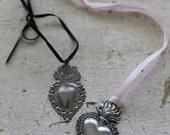 pair of sacred heart milagros