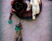 Altered Art Mixed Metal Pendant Necklace with Frozen Charlotte Doll and other Mixed Media Items