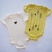 Baby Heart and Arrows Unisex Gift Set of Two Organic Bodysuits Dijon Yellow and Natural 3-6m, 6-12m, 12-18m