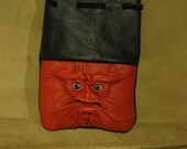 Grichels leather dice/card pouch - black and red with red, silver, and black fish eyes