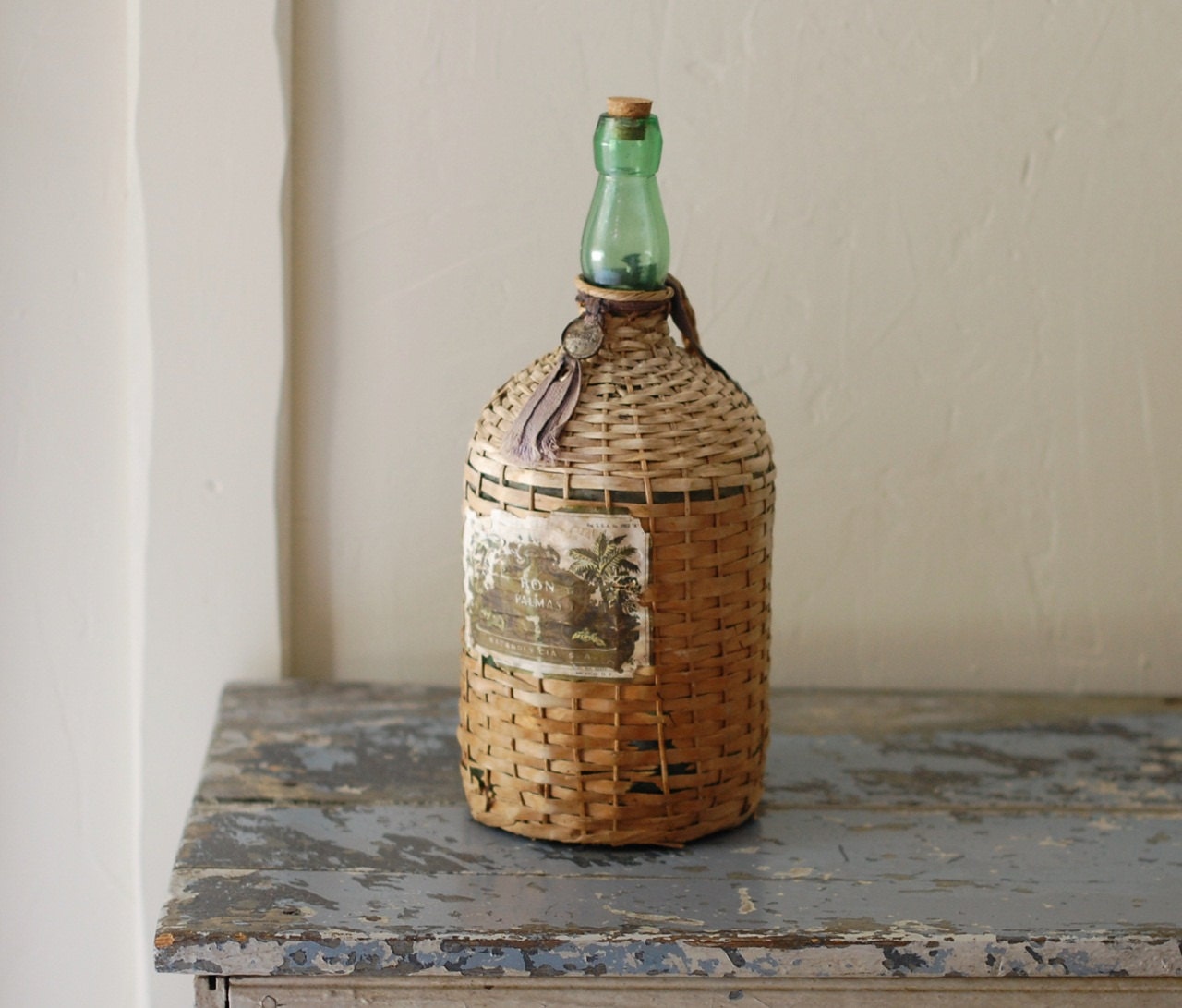 Vintage Demijohn Wine Jug with Wicker Cover and Original Label