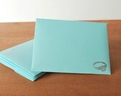 fair aqua envelopes set of five: engagement ring