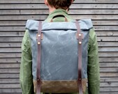 Waxed canvas rucksack/backpack with roll up top and waxed canvas shoulderstraps