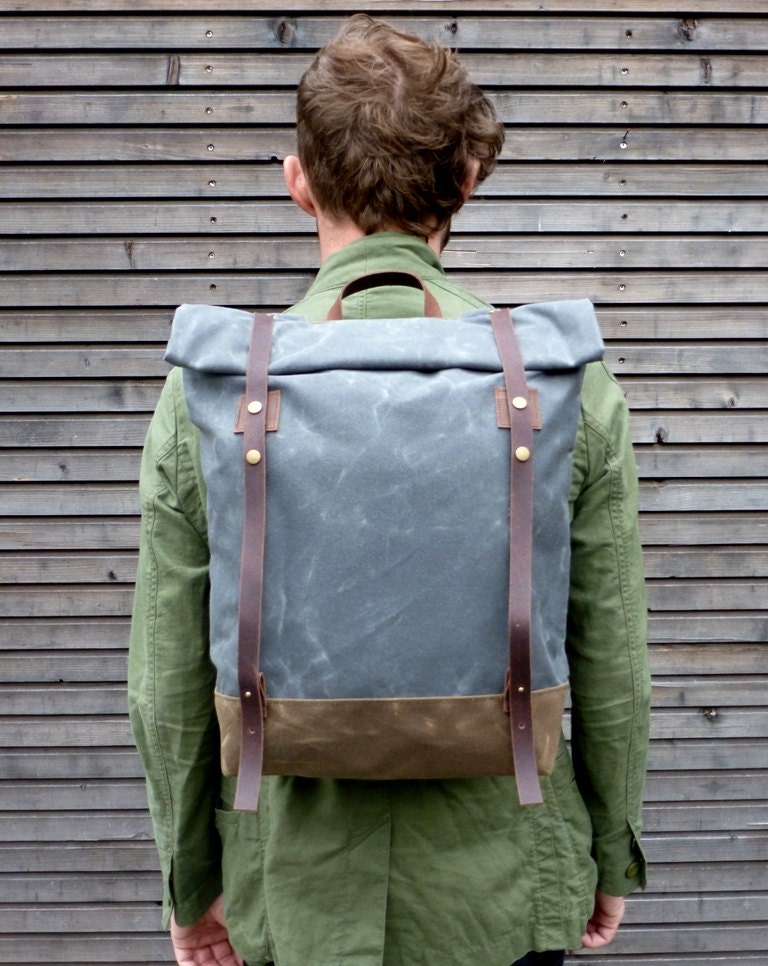 Waxed canvas rucksack/backpack with roll up top and waxed canvas shoulderstraps