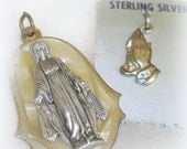 Two Vintage Religious Medals.  Sterling Silver. A Miraculous Medal with Mother of Pearl Backdrop and Silver 'Praying Hands'