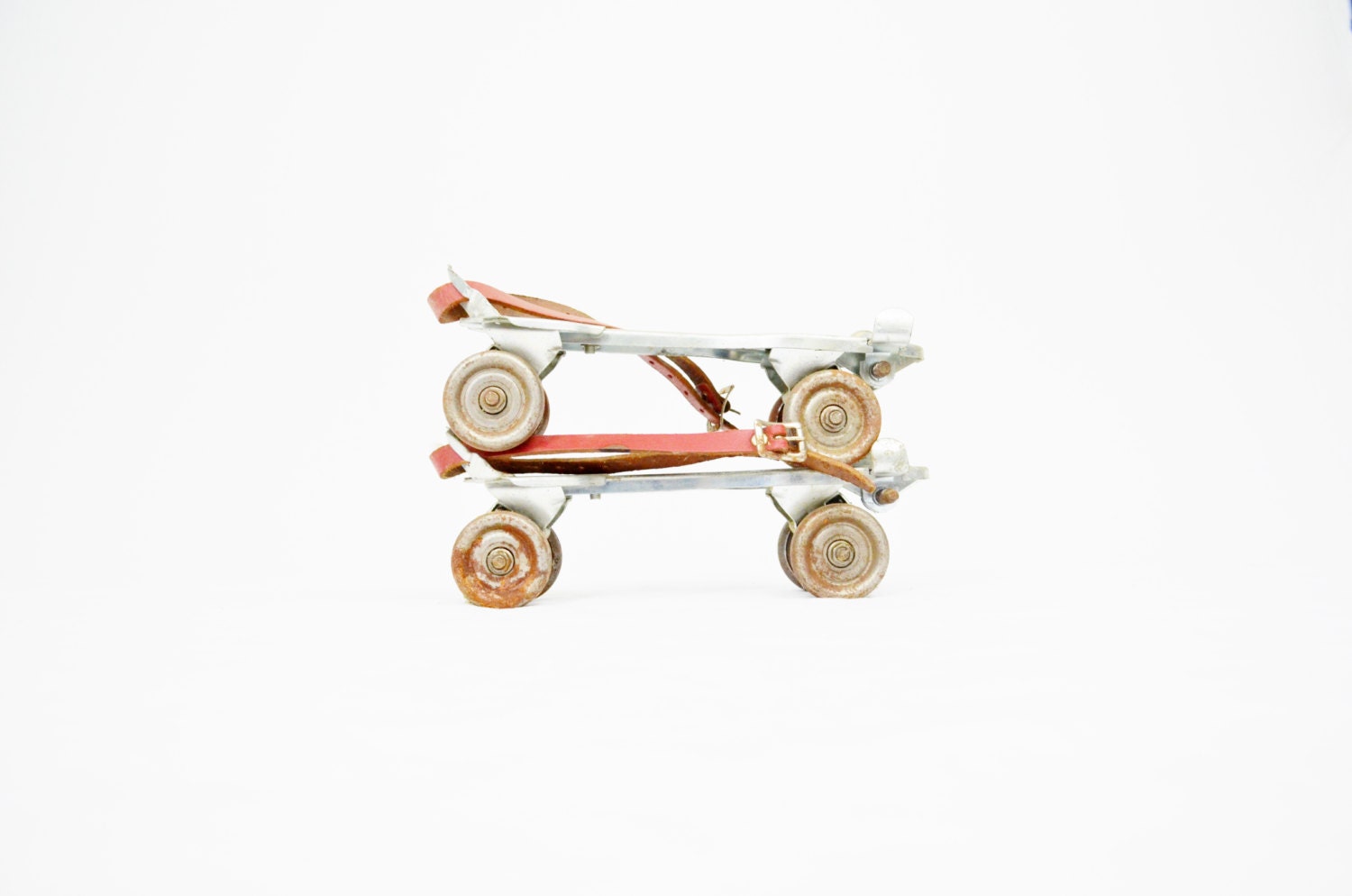 Antique Metal Roller Skates with Leather Straps