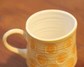 yellow porcelain polka dot mug