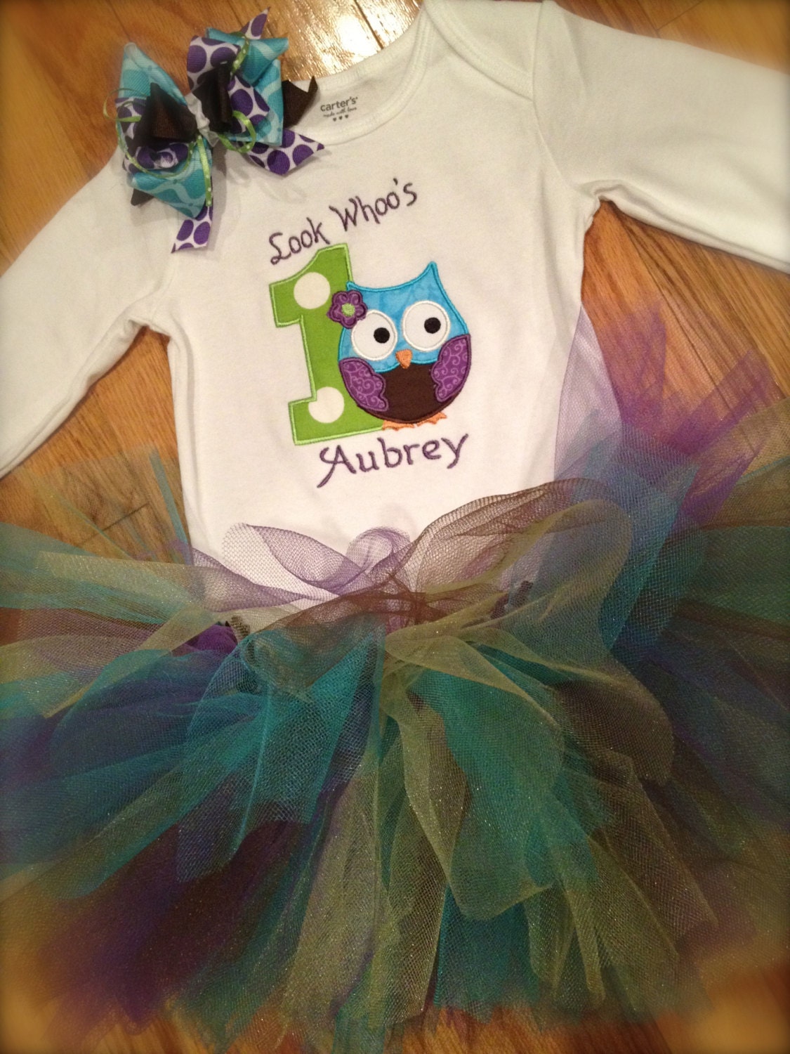 1st birthday owl onesie with name, colorful tutu, and matching hair bow
