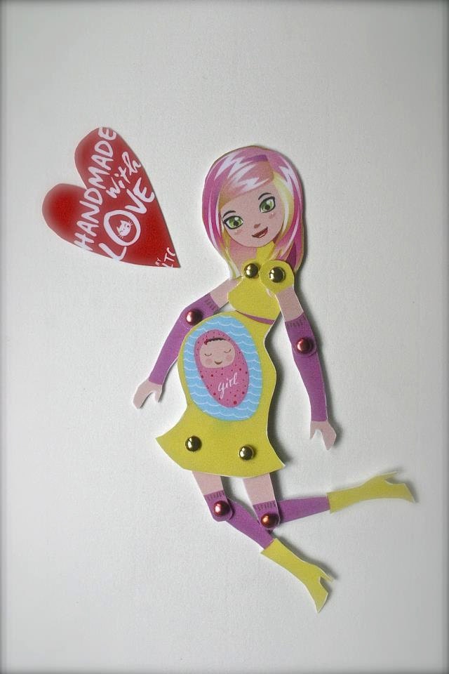 Moveable pregnant paperdoll in yellow and pink dress with multicolor hair - it's a girl