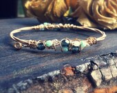 QUEENSLAND Guitar String Bangle.  Beach and Music Inspired, eco-friendly adornment.  Stackable Bangle Bracelet