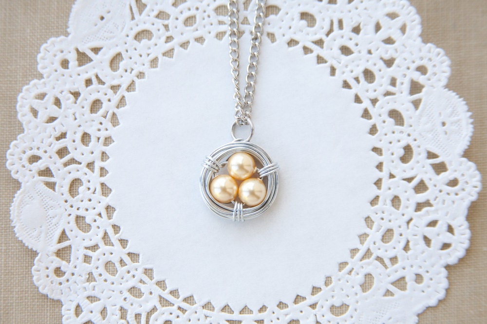 gold pearl wire wrapped bird nest necklace