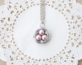 pink pearl wire wrapped bird nest necklace