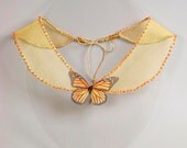 Butterfly collar necklace with orange butterfly. Papillon art bijoux in vintage style with orange beads and yellow chiffon bib colar.