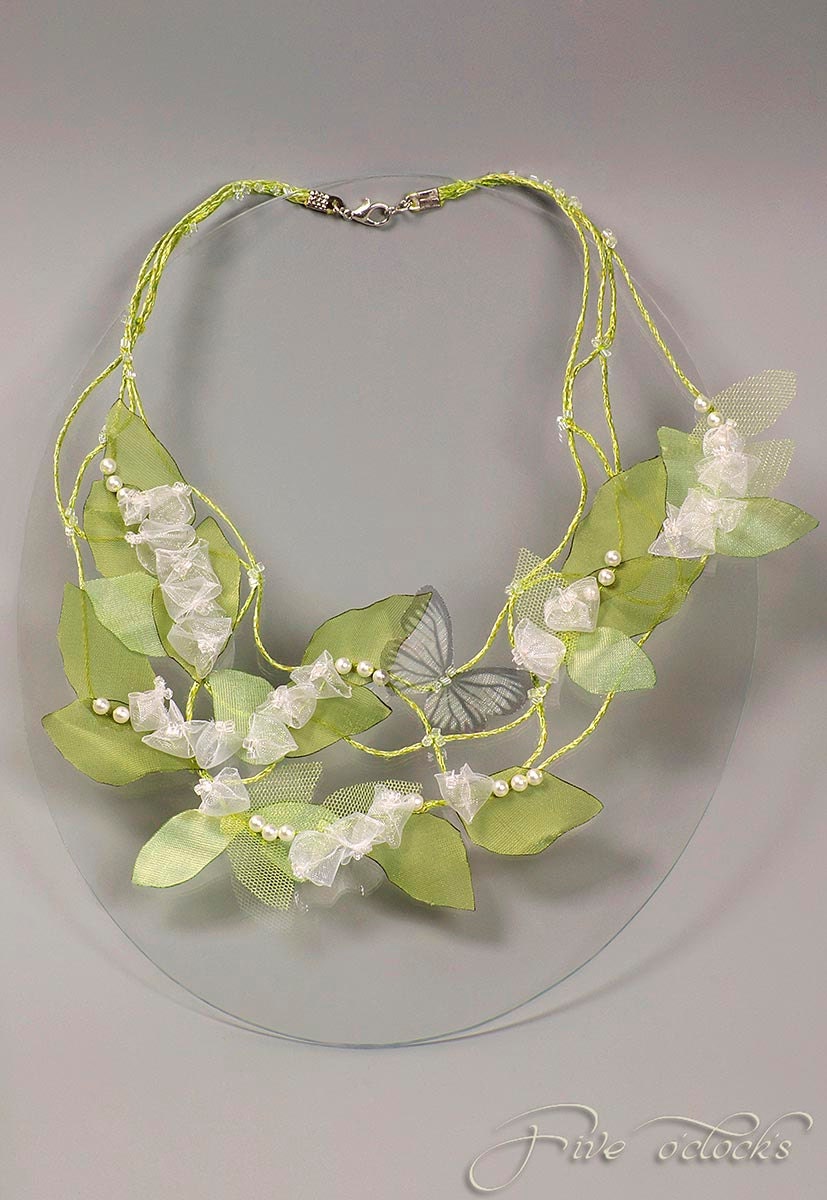 Botanical green wedding necklace with lilly of the valley and gray butterfly. Romantic floral jewelry for fairy woodland wedding.