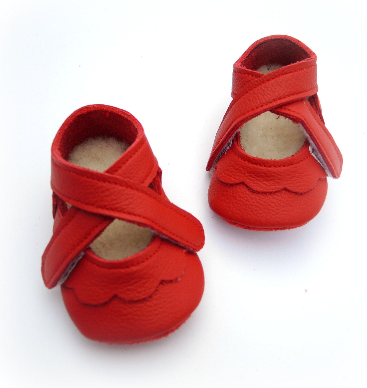 Handmade leather shoes for babies, toddlers and children.  Red leather soft soled baby shoes.