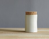wood fired porcelain canister. white pottery corked jar. modern minimal pottery ceramic