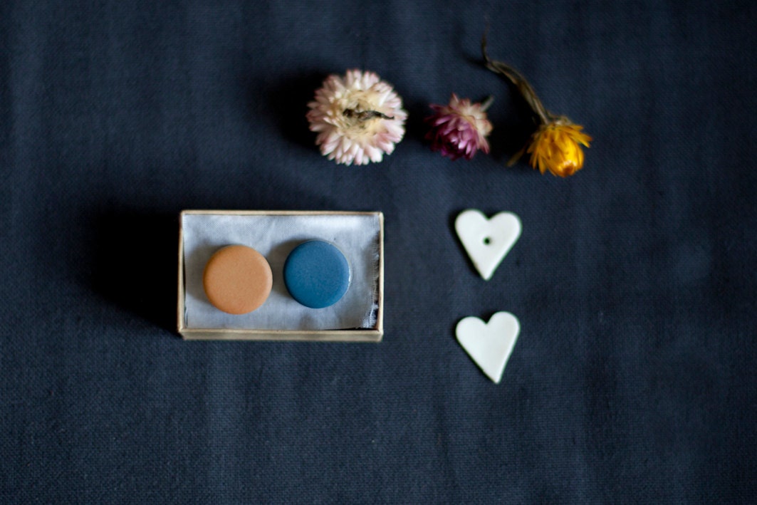 pins in orange and egyptian blue