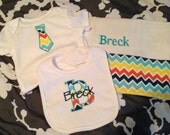 Tie applique onesie, initial bib, and matching monogrammed burpcloth