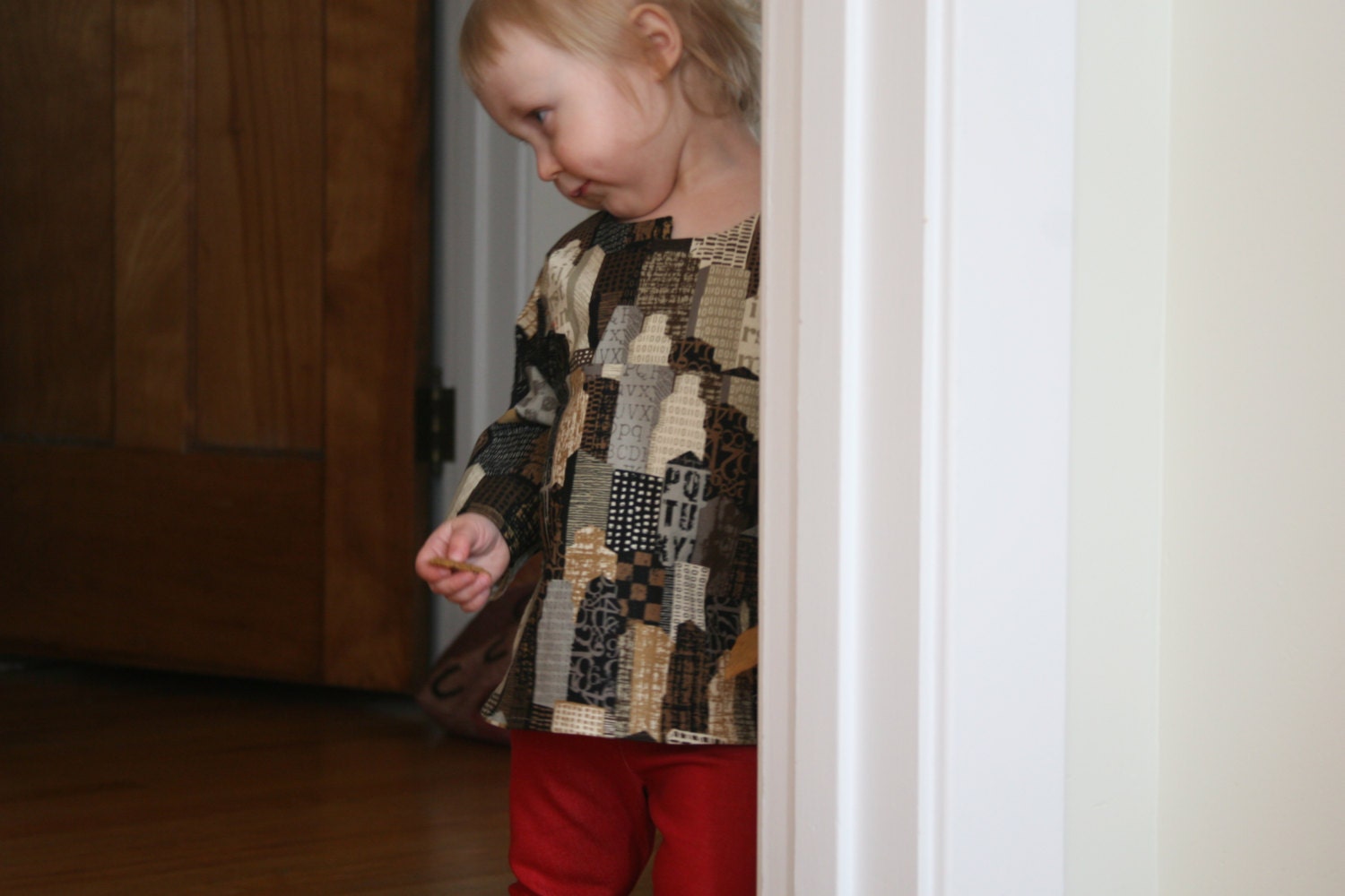 2T cityscape toddler top, asymmetrical neckline
