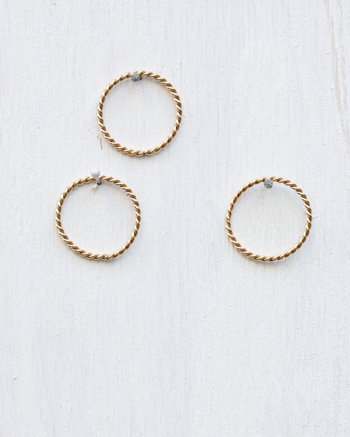 Twisted knuckle rings